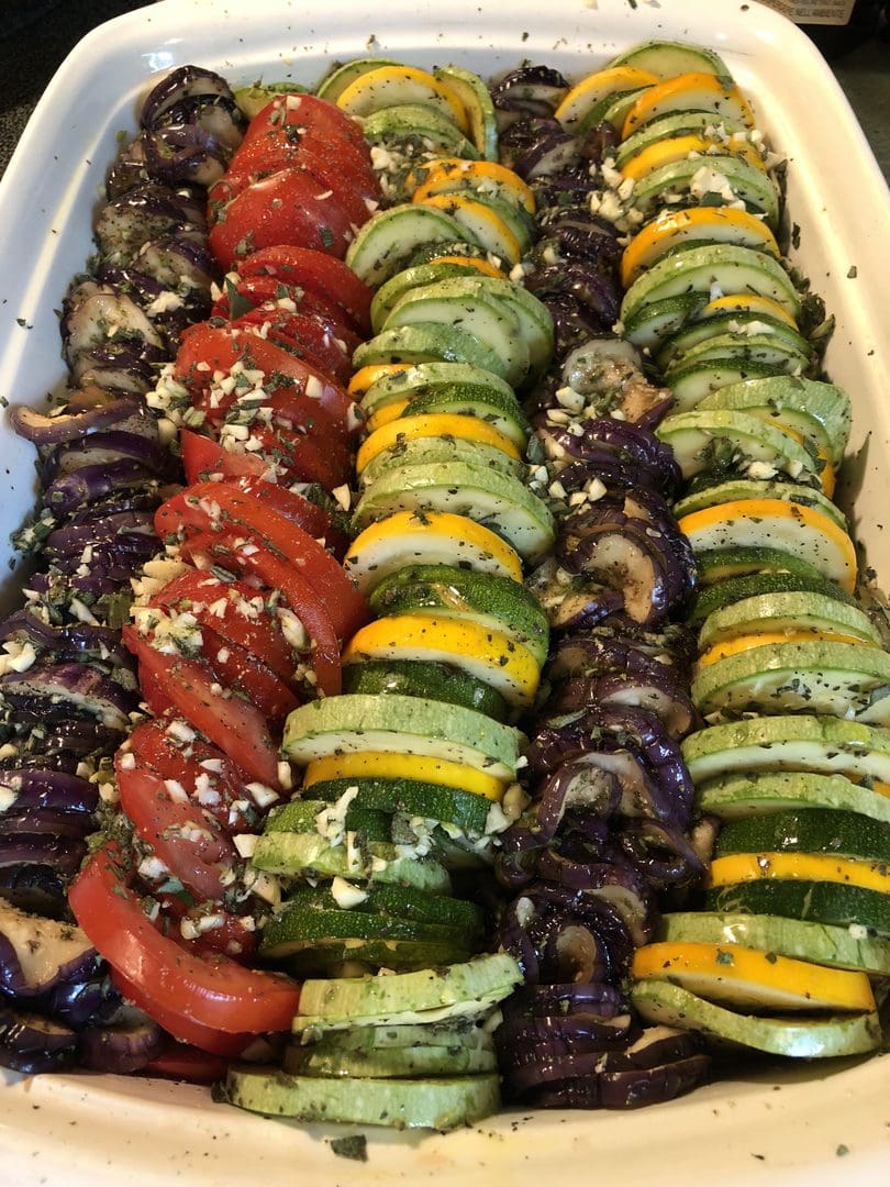 Colorful grilled vegetable skewers with zucchini, tomatoes, and eggplant.