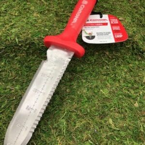 Serrated garden knife with red handle