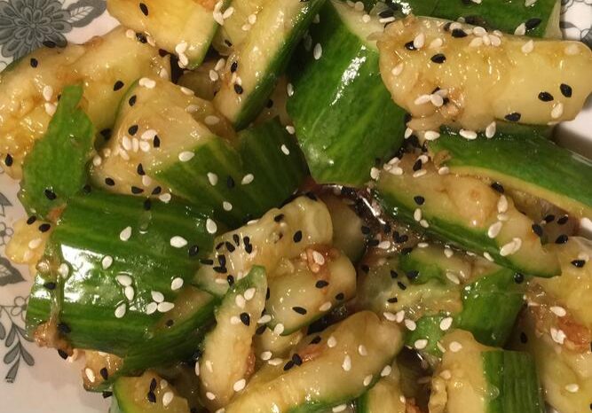 Stir-fried bitter melon with egg and sesame seeds.